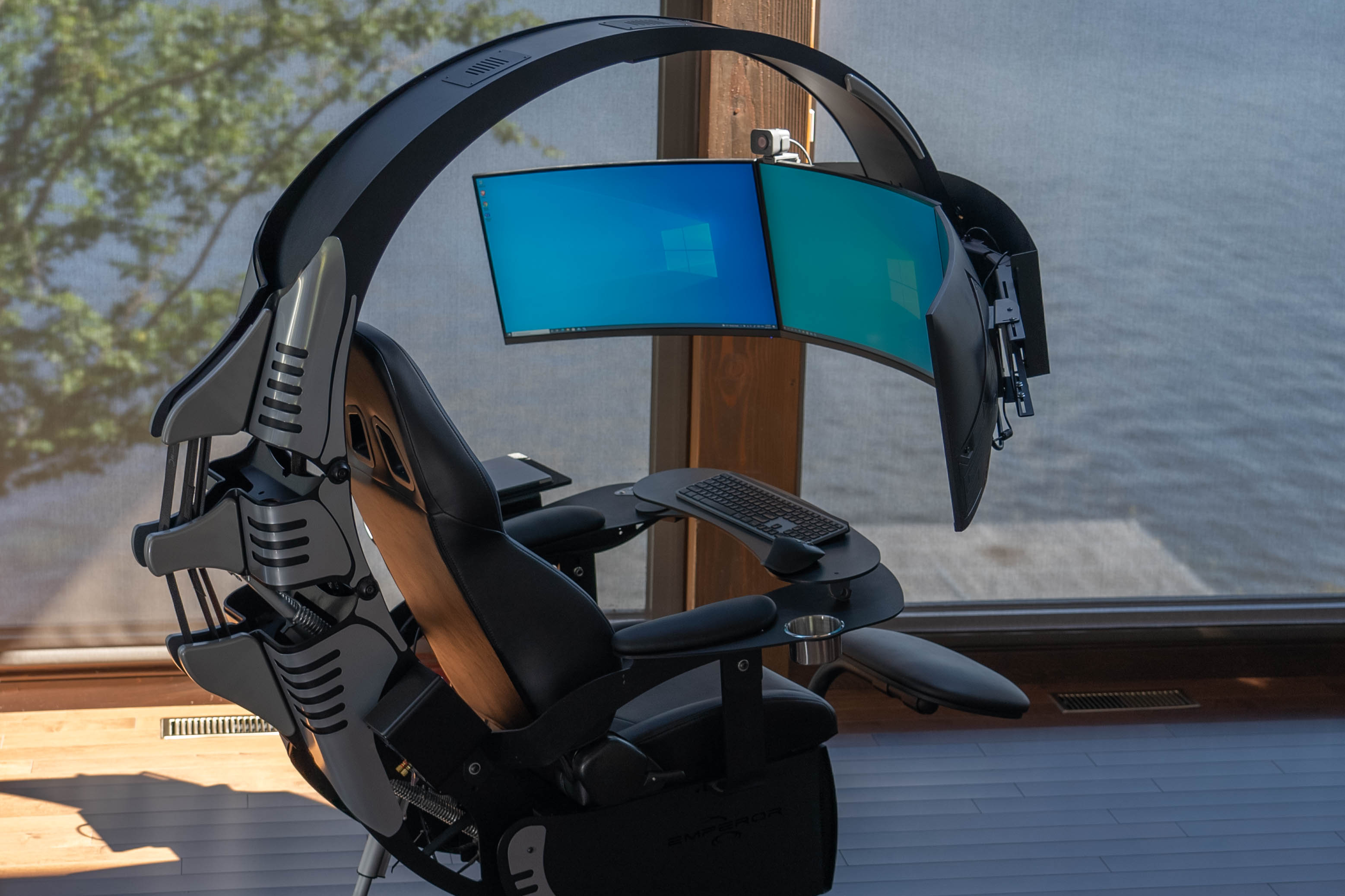 Emperor XT ergonomic workstation with three monitors in a home office